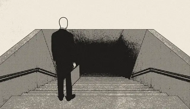 A figure seen from behind at the top of a stairway going down